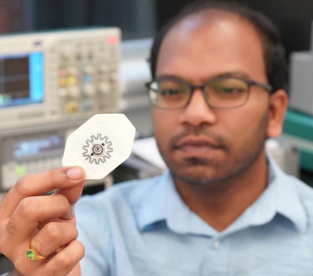 Researcher Rajaram Kaveti holds the water-powered, electronics-free dressing (WPED) for electrical stimulation of wounds. 