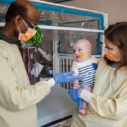 Drs. Kiran Musunuru and Rebecca Ahrens-Nicklas with patient KJ.