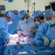 Inderbir Gill, MD (L) and Nima Nassiri, MD (C) perform the world’s first-in-human bladder transplant.