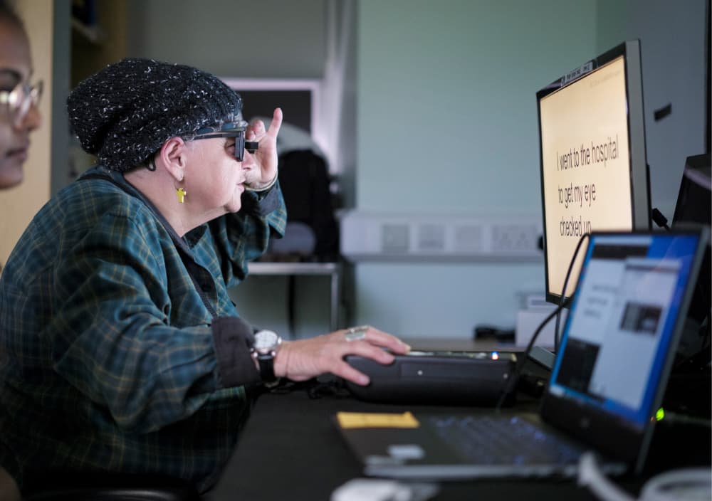 Study partipant Sheila Irvine, a patient at Moorfields, training with the PRIMA device 